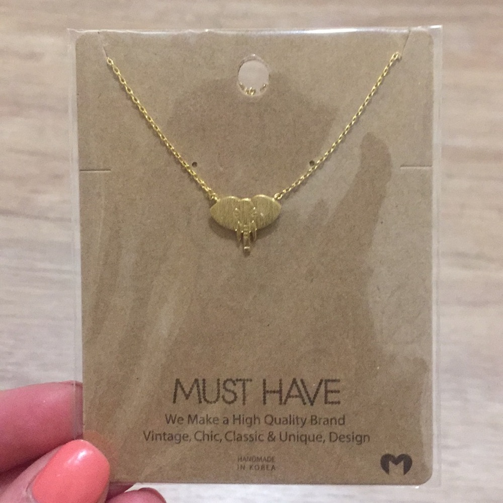 Gold elephant necklace